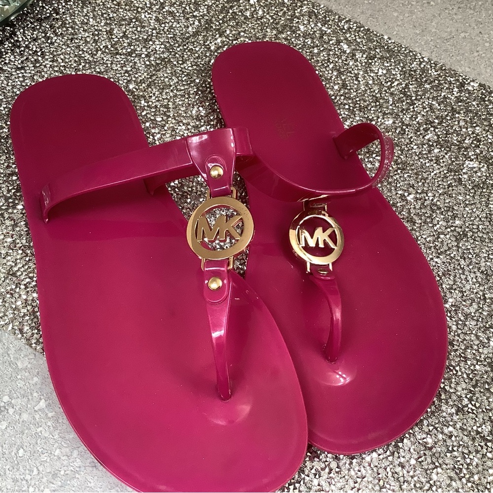 Michael Kors jelly sandals.